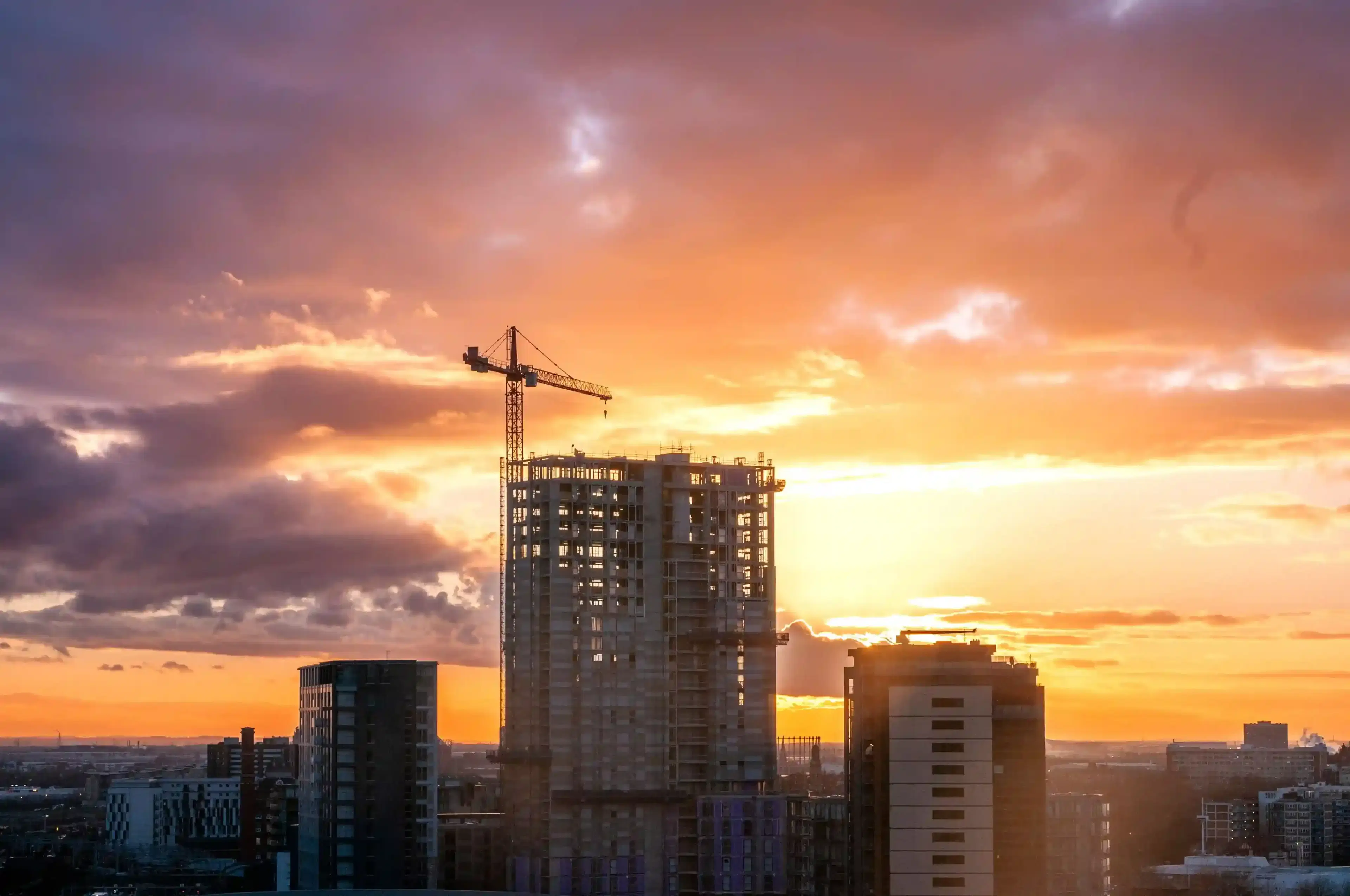 A building project at sunset