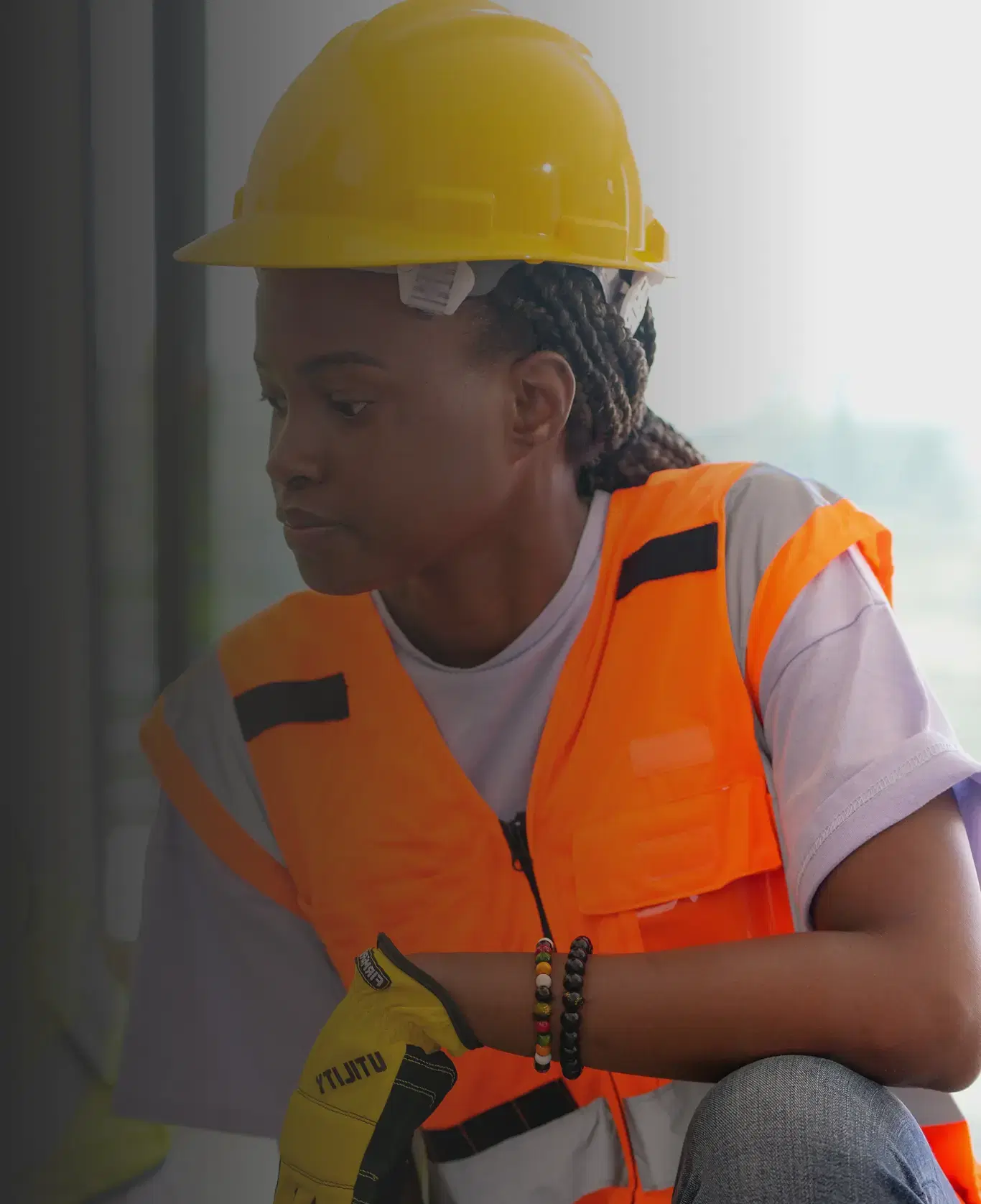 Builder wearing safety equipment